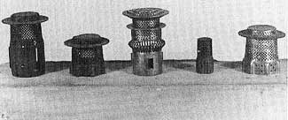photo of five Bradley & Hubbard flame deflectors for center draft burners
