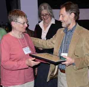 Photo of Rushlight Editor Marianne Nolan Receiving Service Award